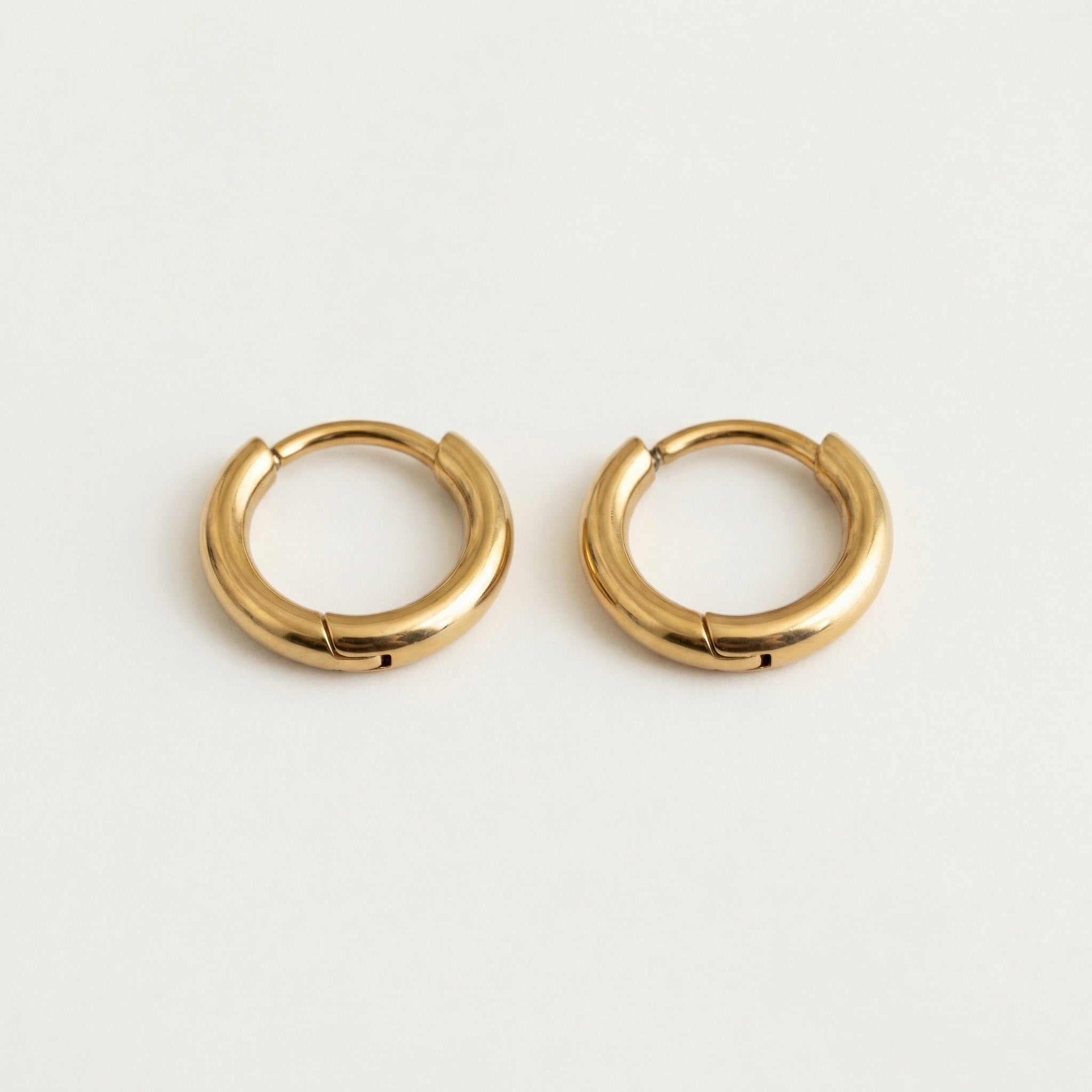 Gold-plated hoops, top-down view