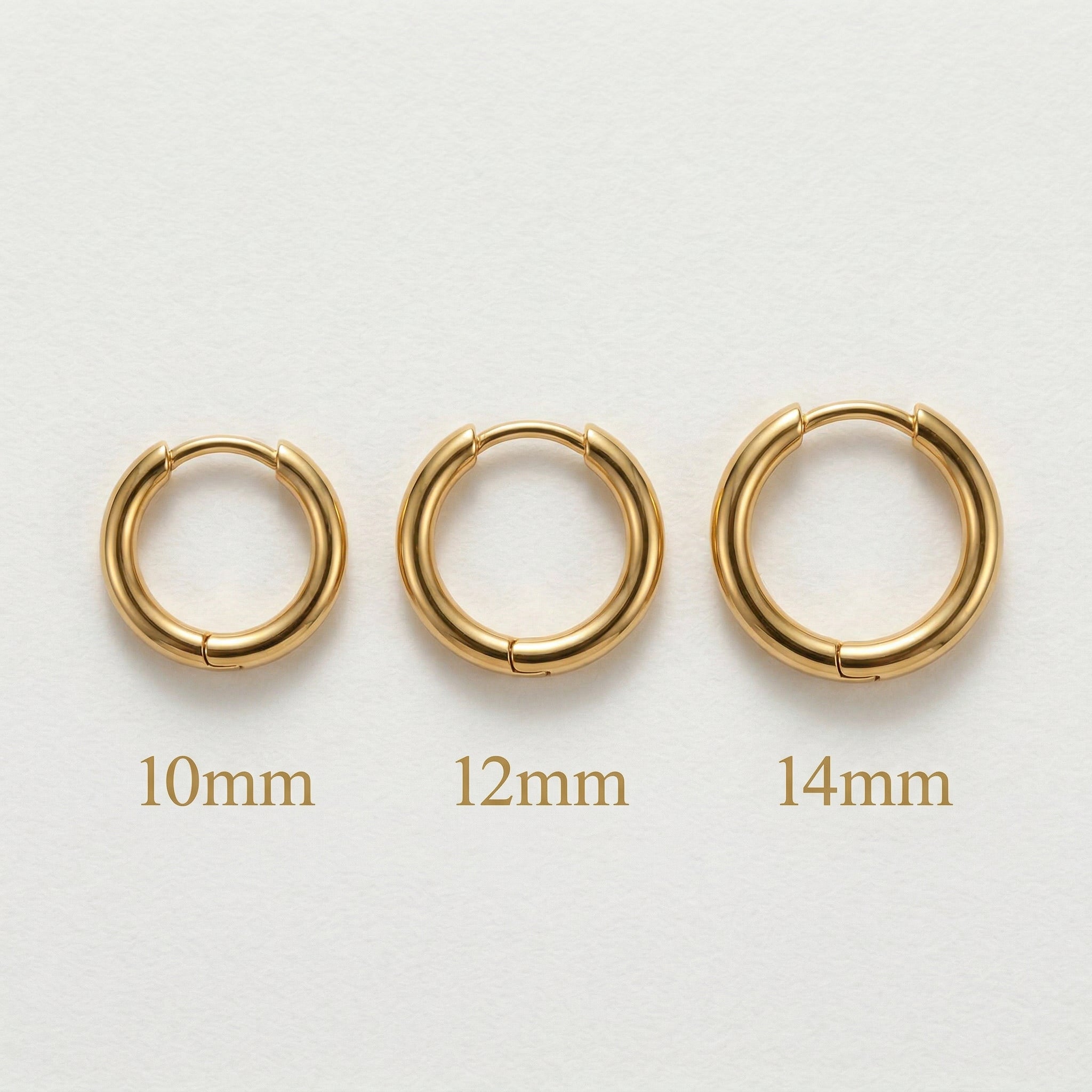 Gold-plated three gold hoops with size labels