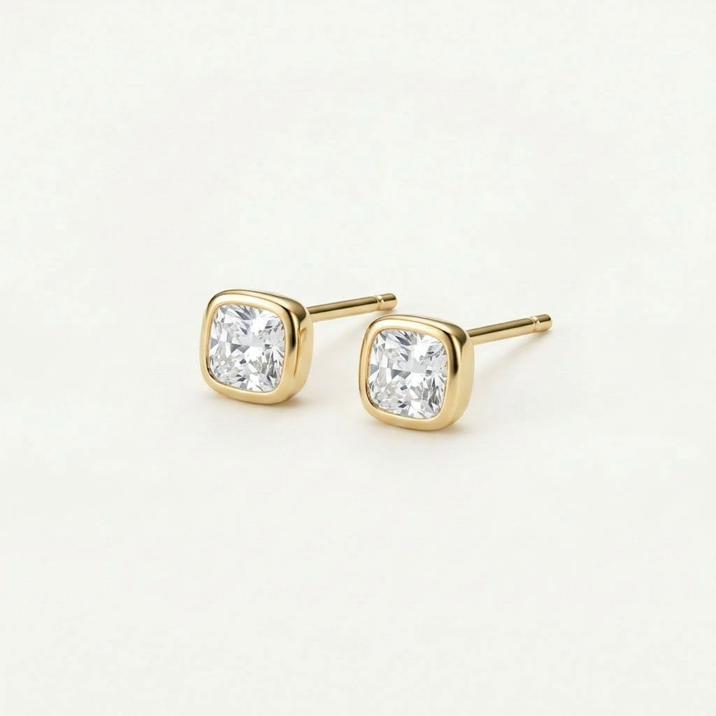 Gold-plated stud earrings with posts visible