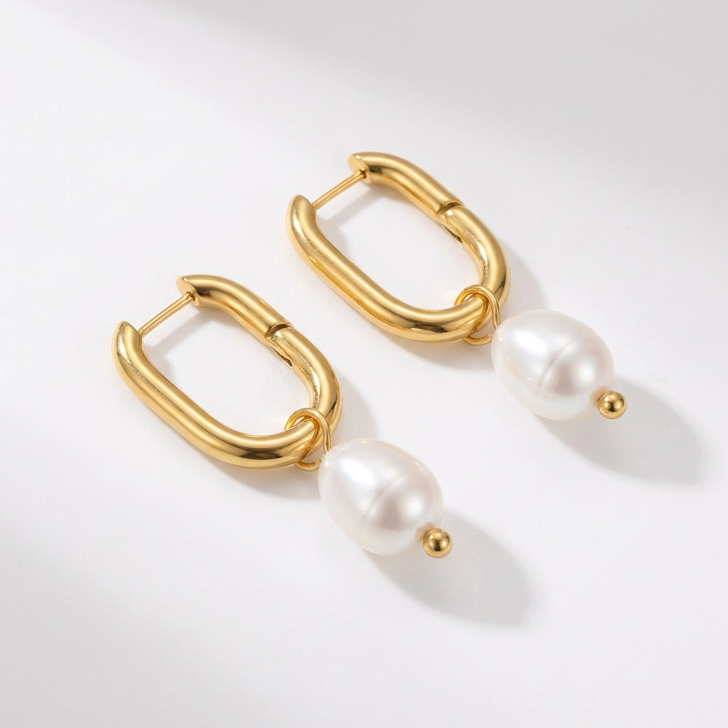 Gold-plated hoop earrings with pearls, angled view