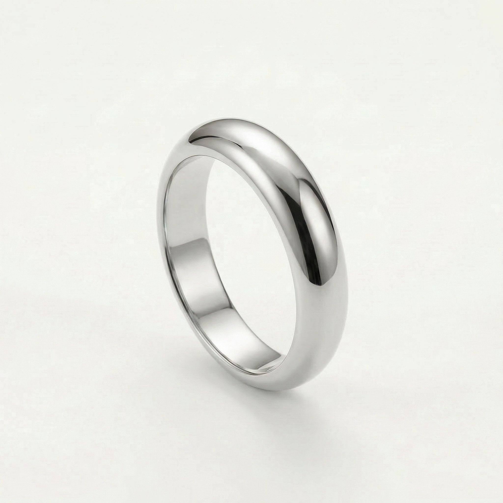 Silver chunky ring on white background