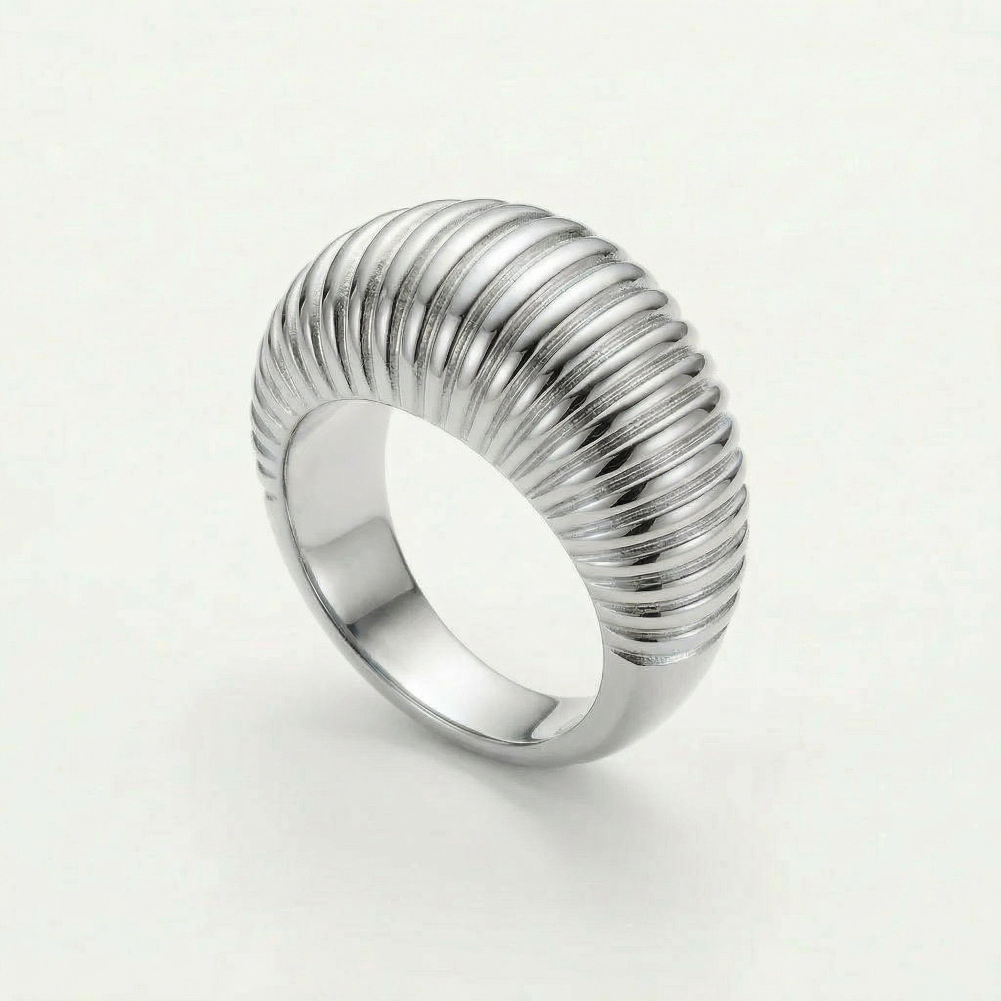 Silver ribbed dome ring on white