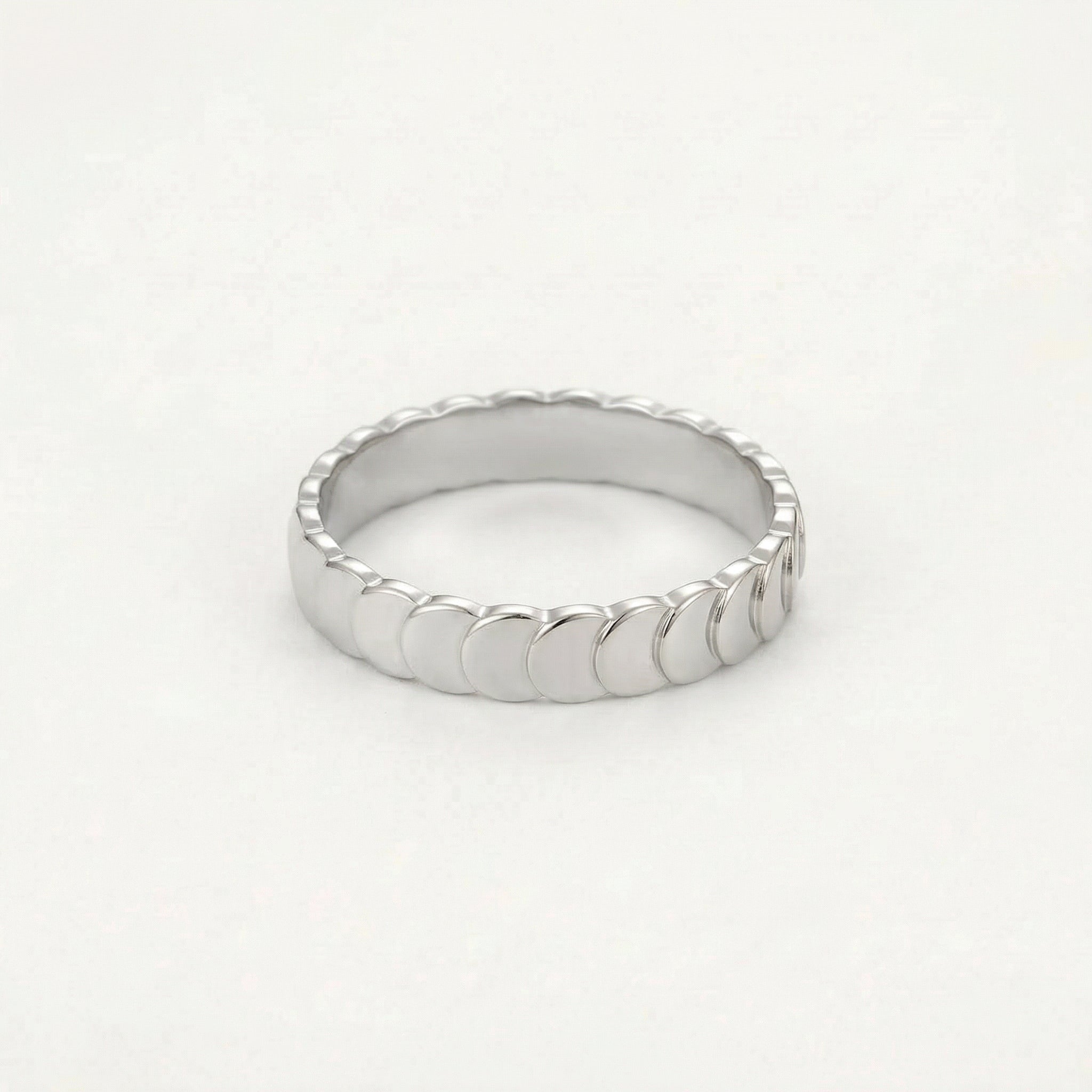Silver top-down view of scalloped ring