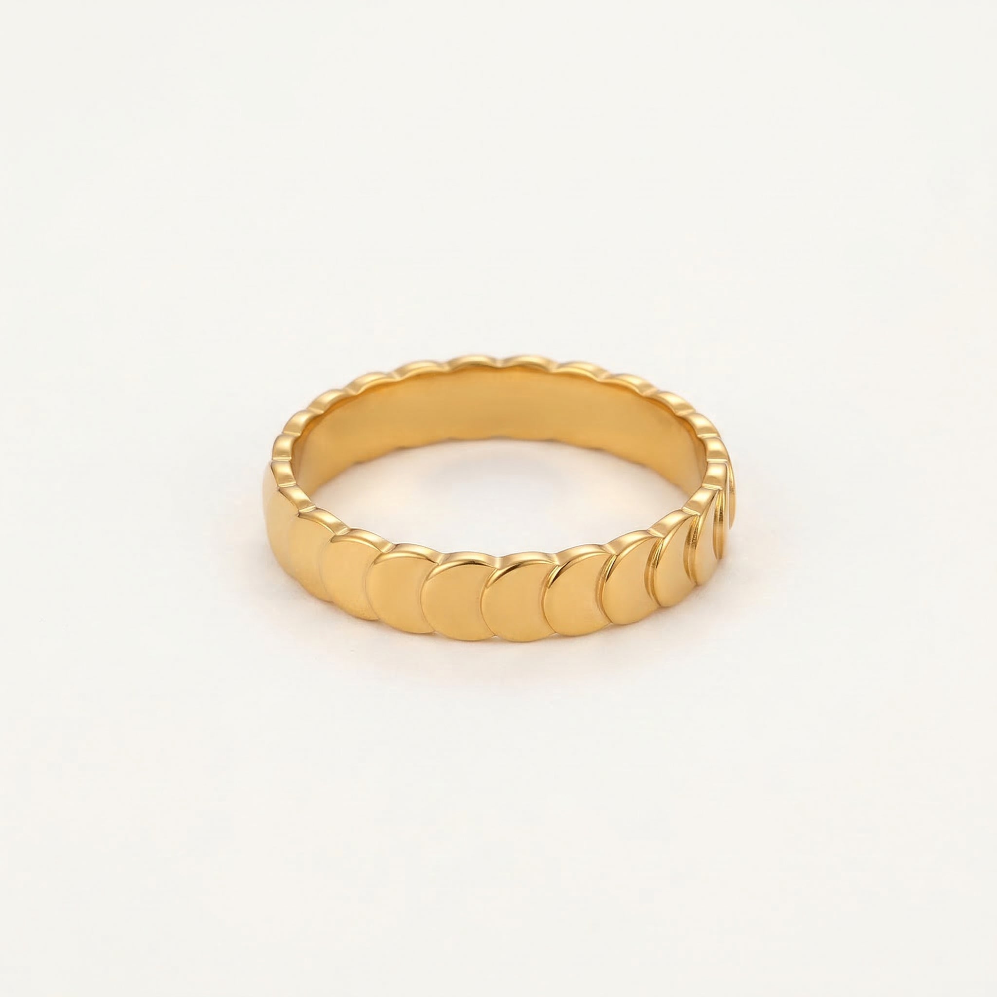 Gold-plated top-down view of gold scalloped ring