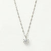 Silver necklace with a round brilliant-cut diamond in a six-prong setting on a flat oval link chain.