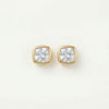 Gold stud earrings with cushion-cut diamonds in bezel settings