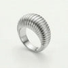 Silver dome ring with ridged, corrugated texture on top.