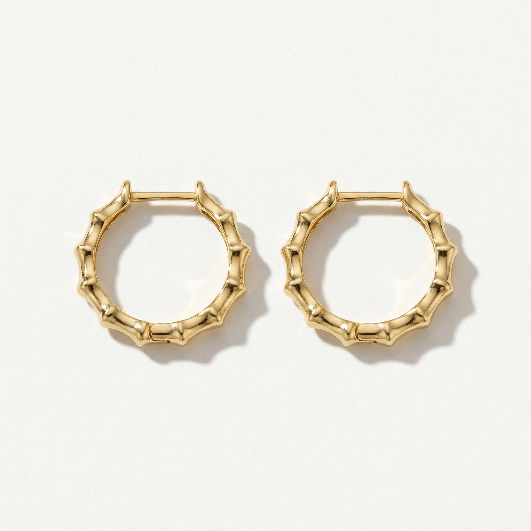 Gold-plated bamboo hoop earrings side-by-side