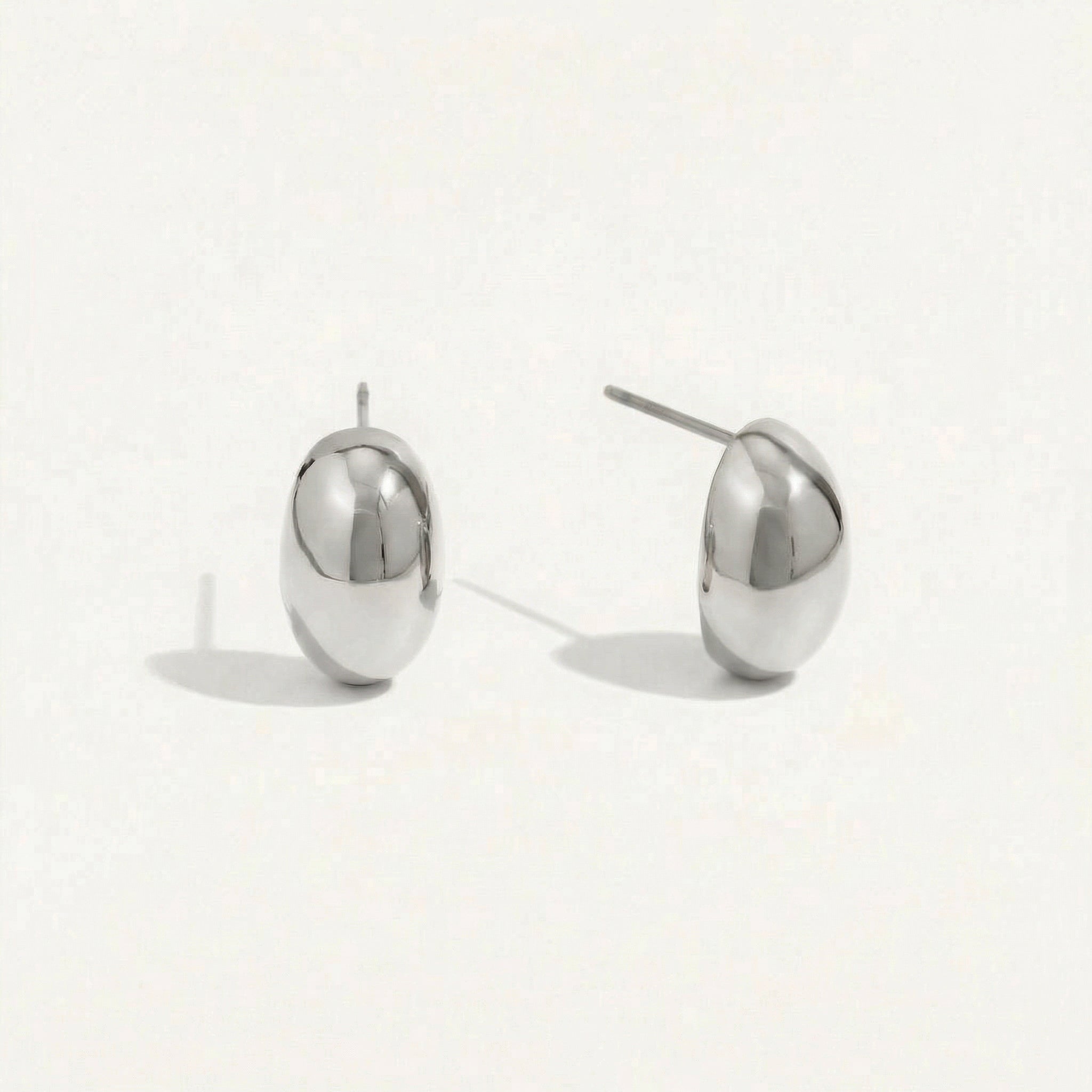 Silver bean stud earrings