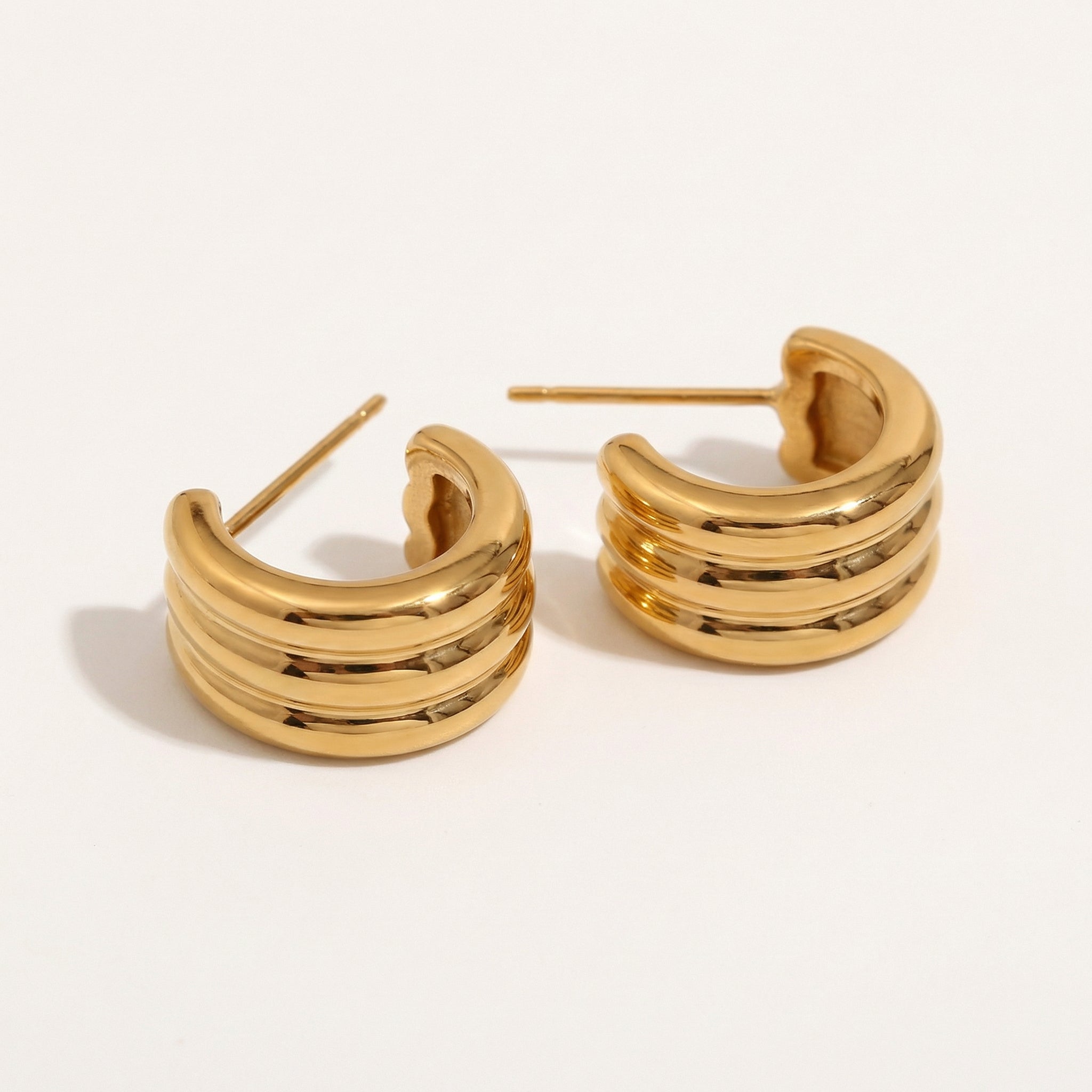 Gold-plated earrings from a different angle