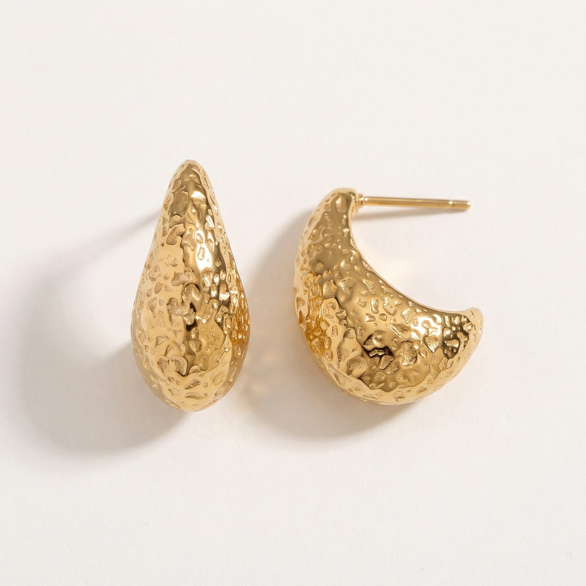 Gold-plated top-down view of hammered gold hoops
