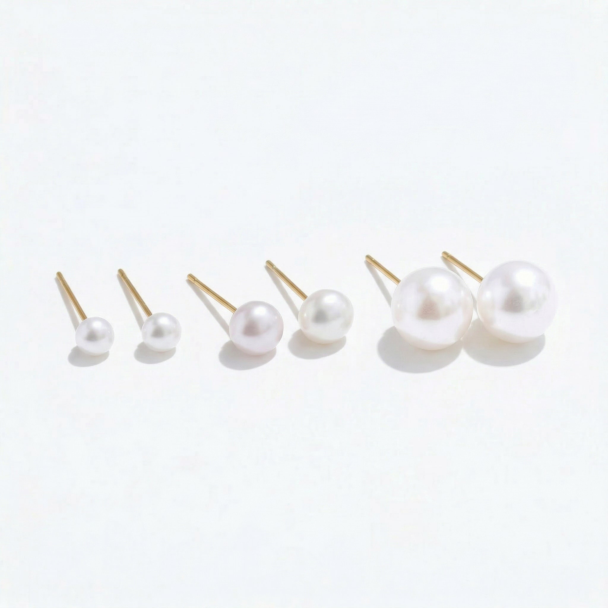 Gold-plated various sizes of pearl stud earrings
