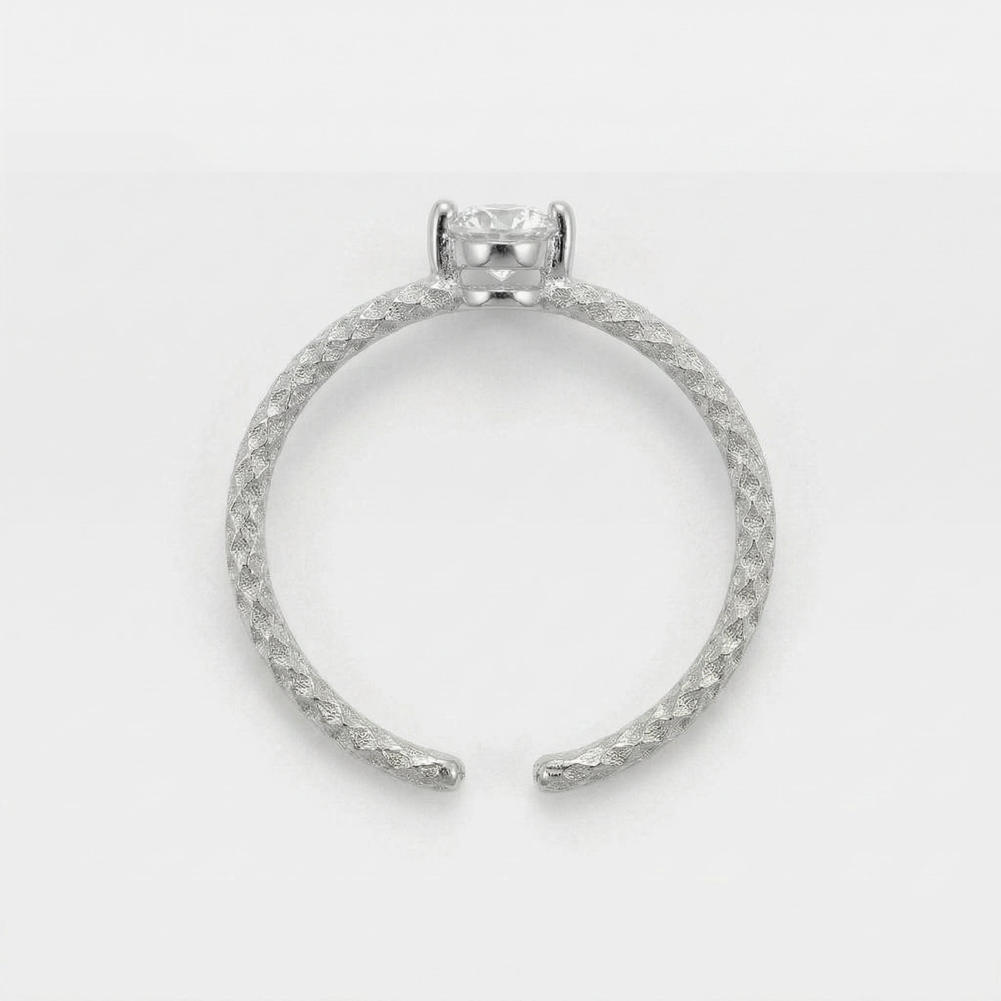 Silver top-down view of textured ring band