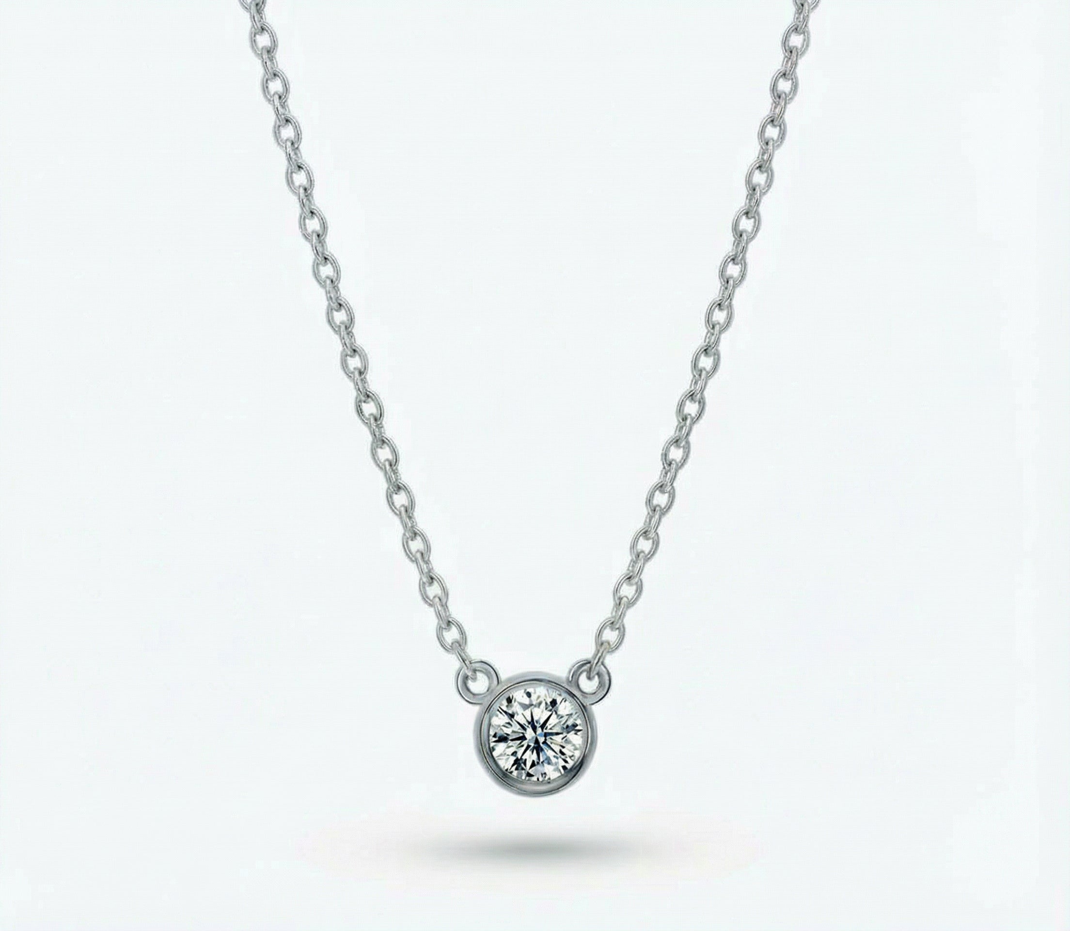 Pendant necklace silver chain with single bezel-set diamond