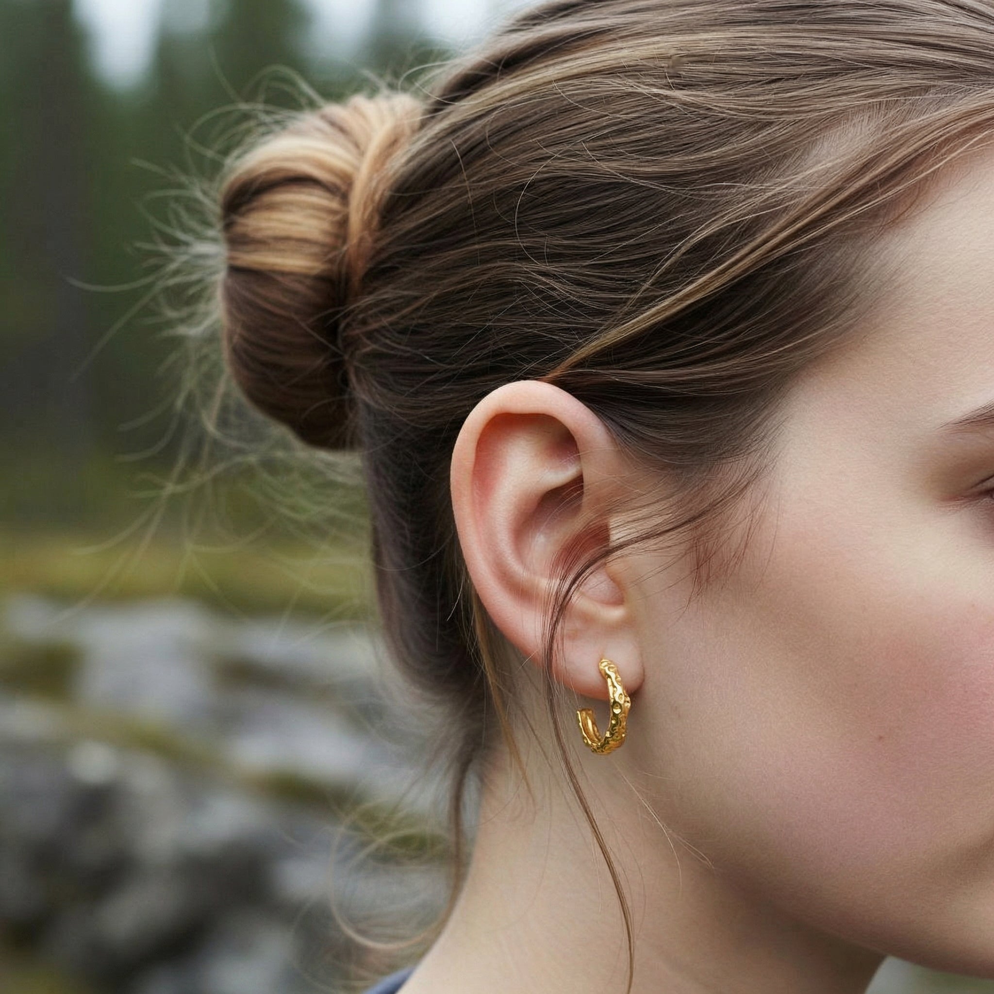 Hoop earrings gold-plated earring worn on model with hair up