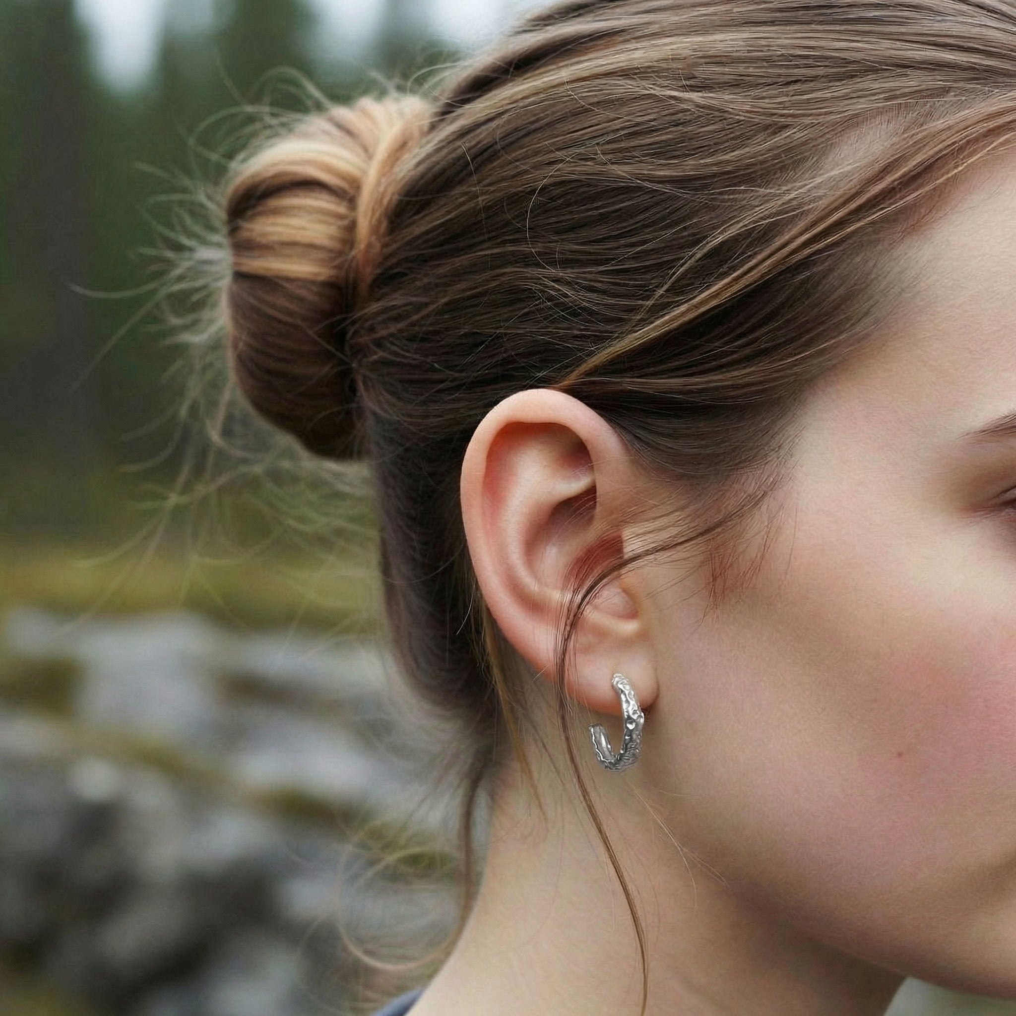 Hoop earrings silver earring on model with hair up