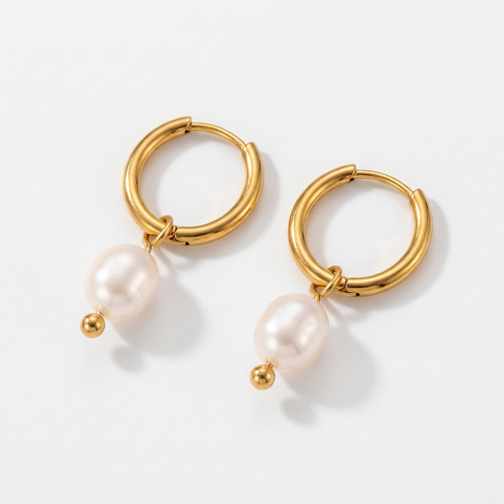 Gold-plated hoop earrings with pearls at angle
