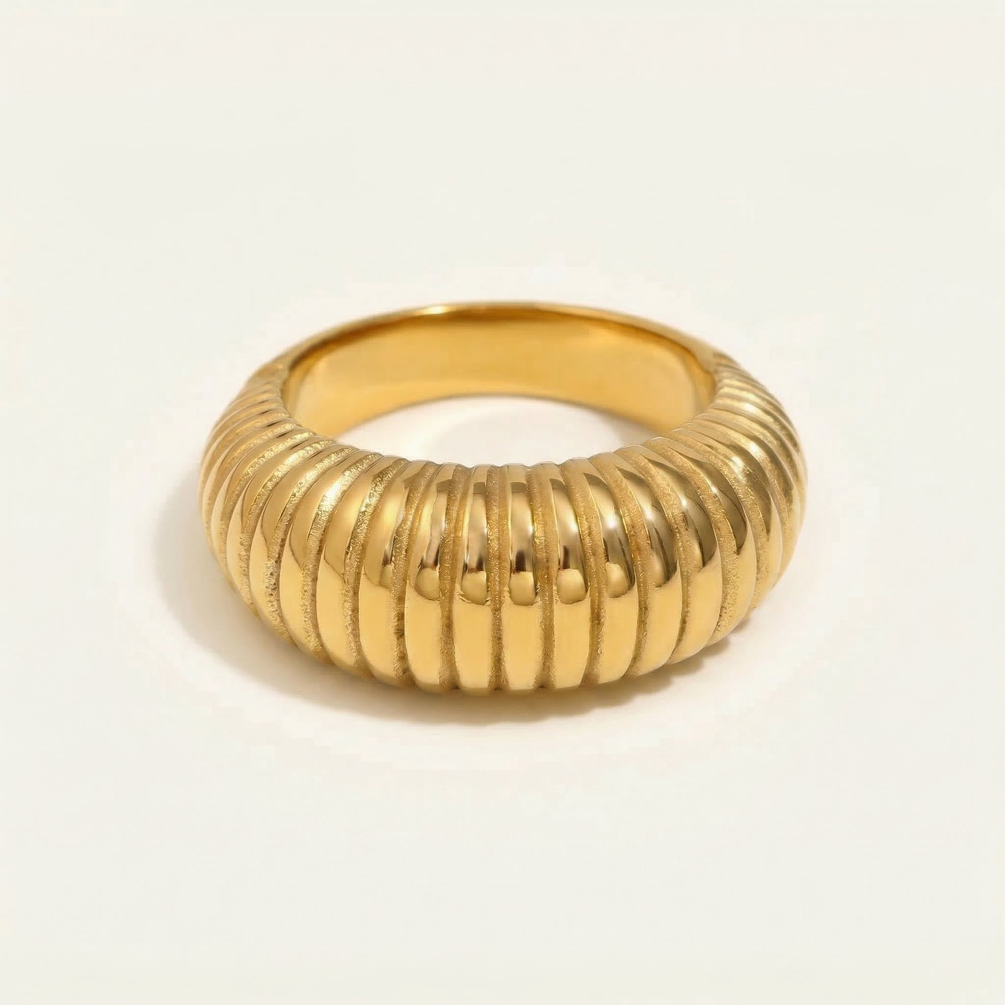 Gold-plated top-down view of ribbed gold ring