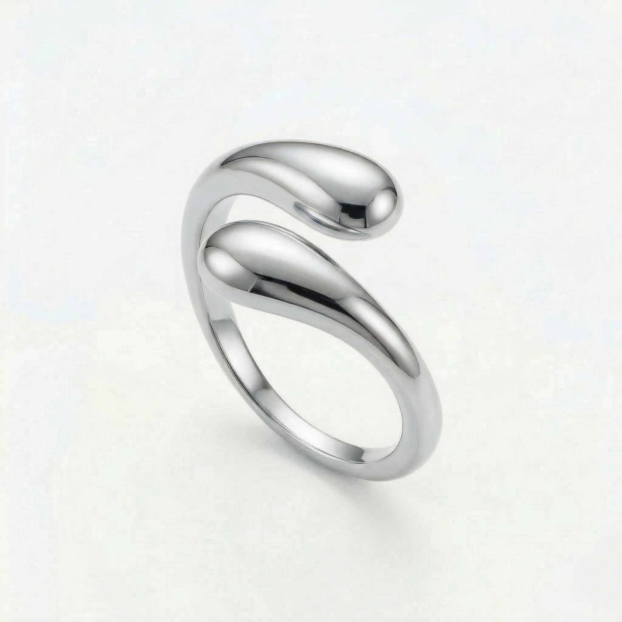 Silver twist hug ring on white