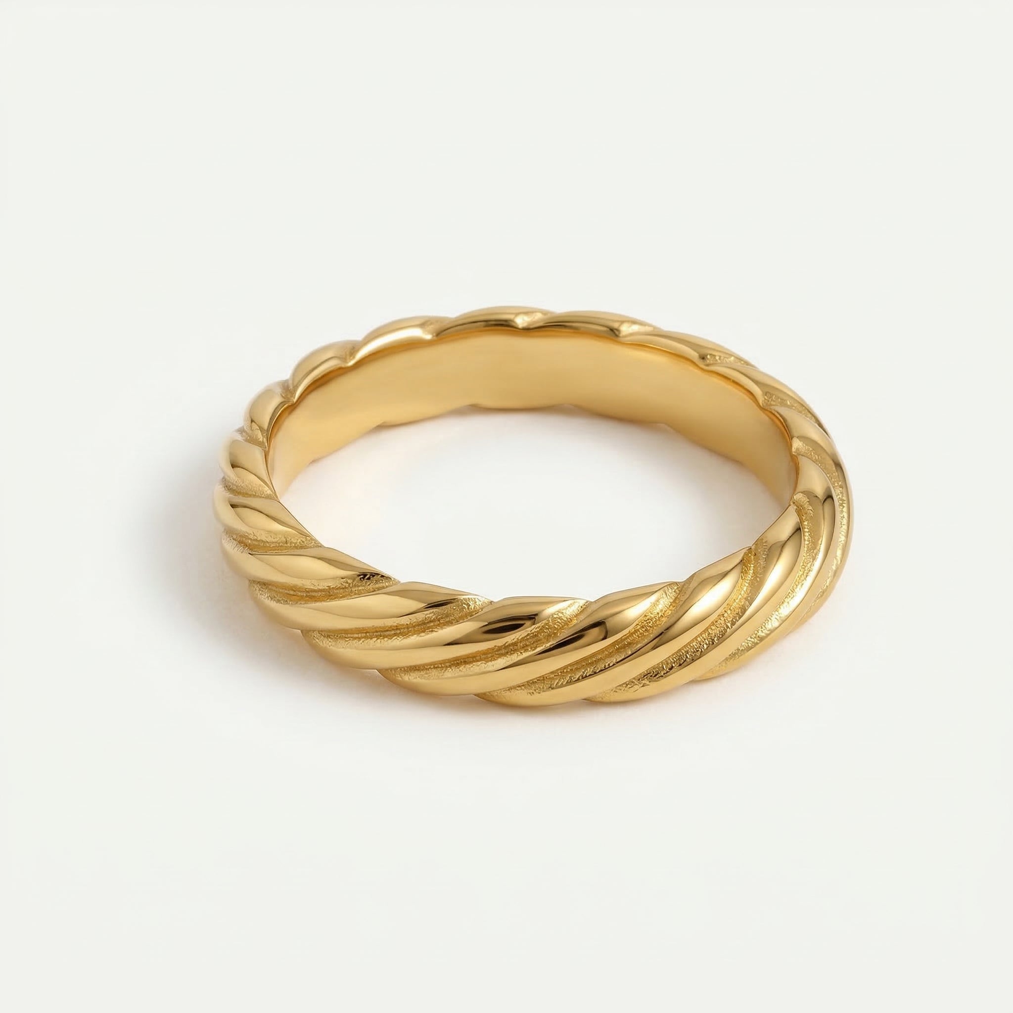 Gold-plated top-down view of twisted ring